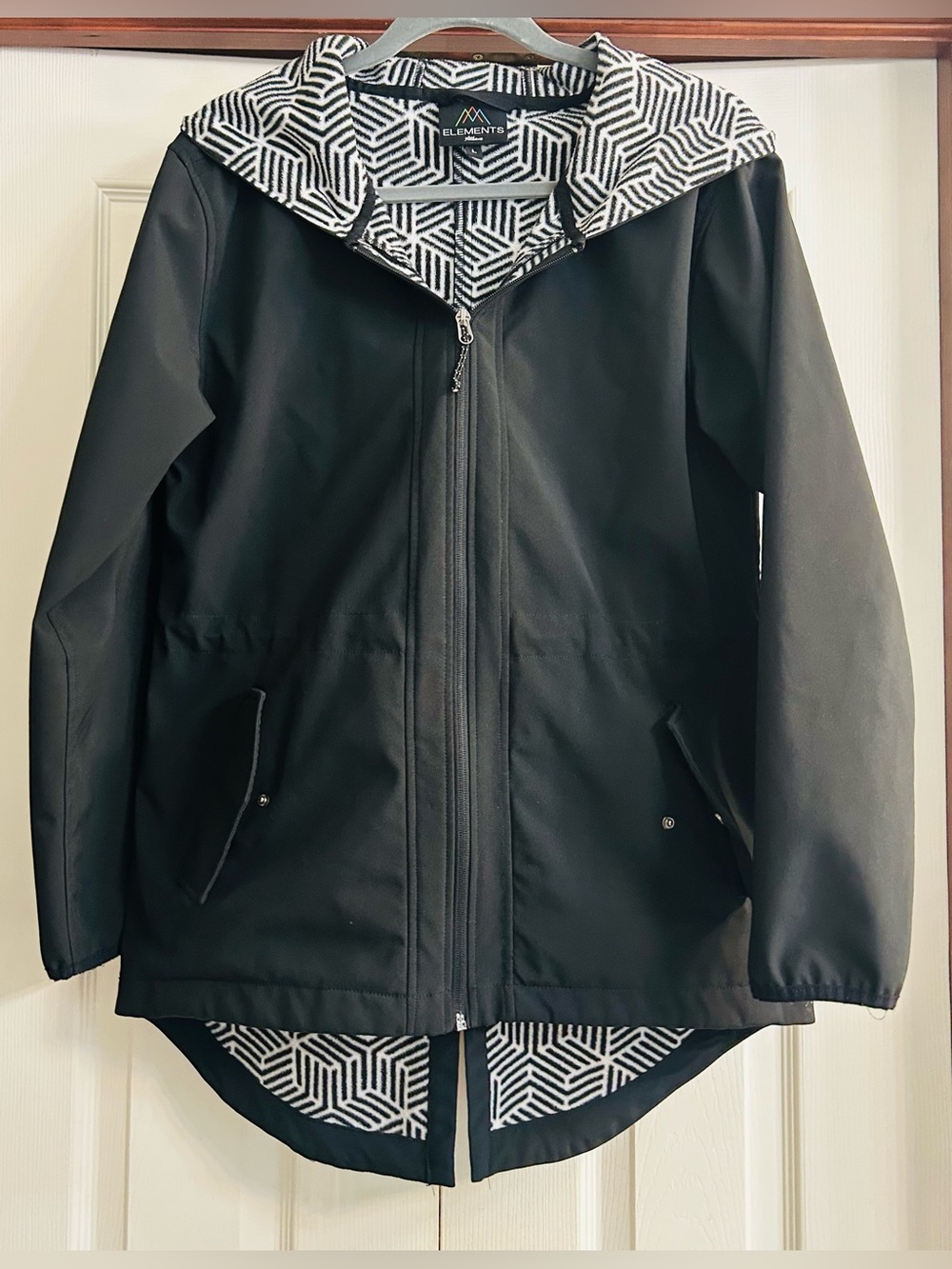 Elements Athleisure women's black hooded jacket, geometric inside lining